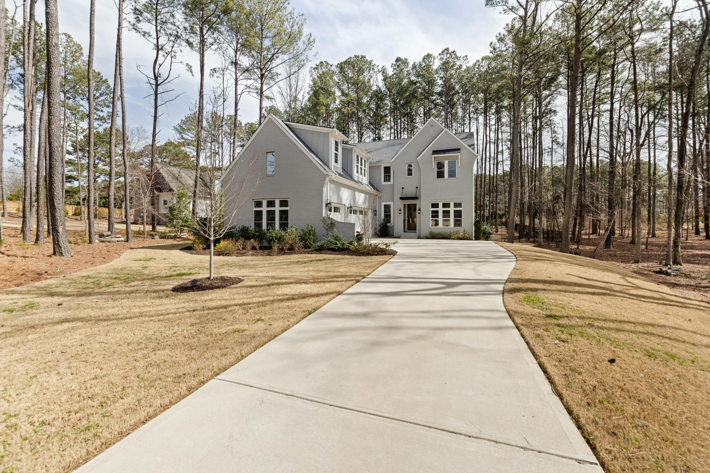 Modern suburban home with clean exterior — Battle Born Pressure Washing serving Loganville, GA