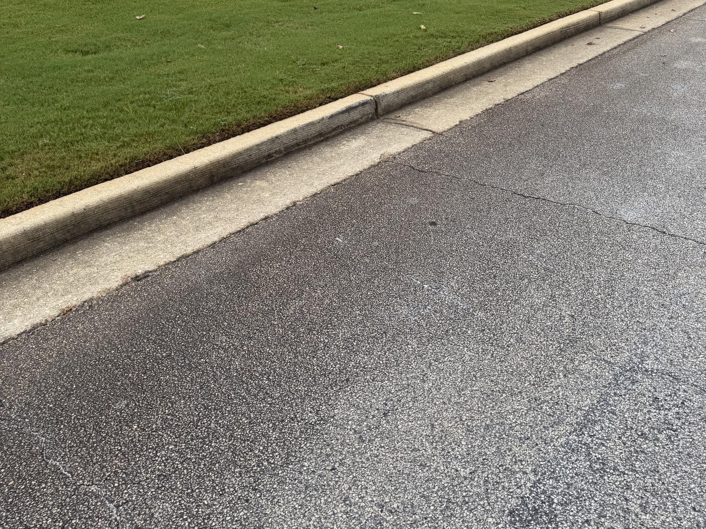 Curb and street edge, Loganville, after pressure washing