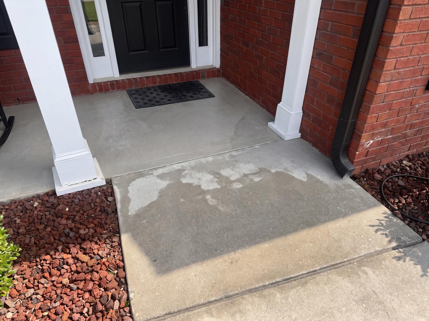 Front porch walkway in Loganville, GA before and after pressure washing, after